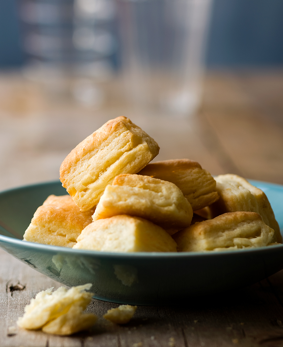 Stack of soft flaky biscuits in a bowl