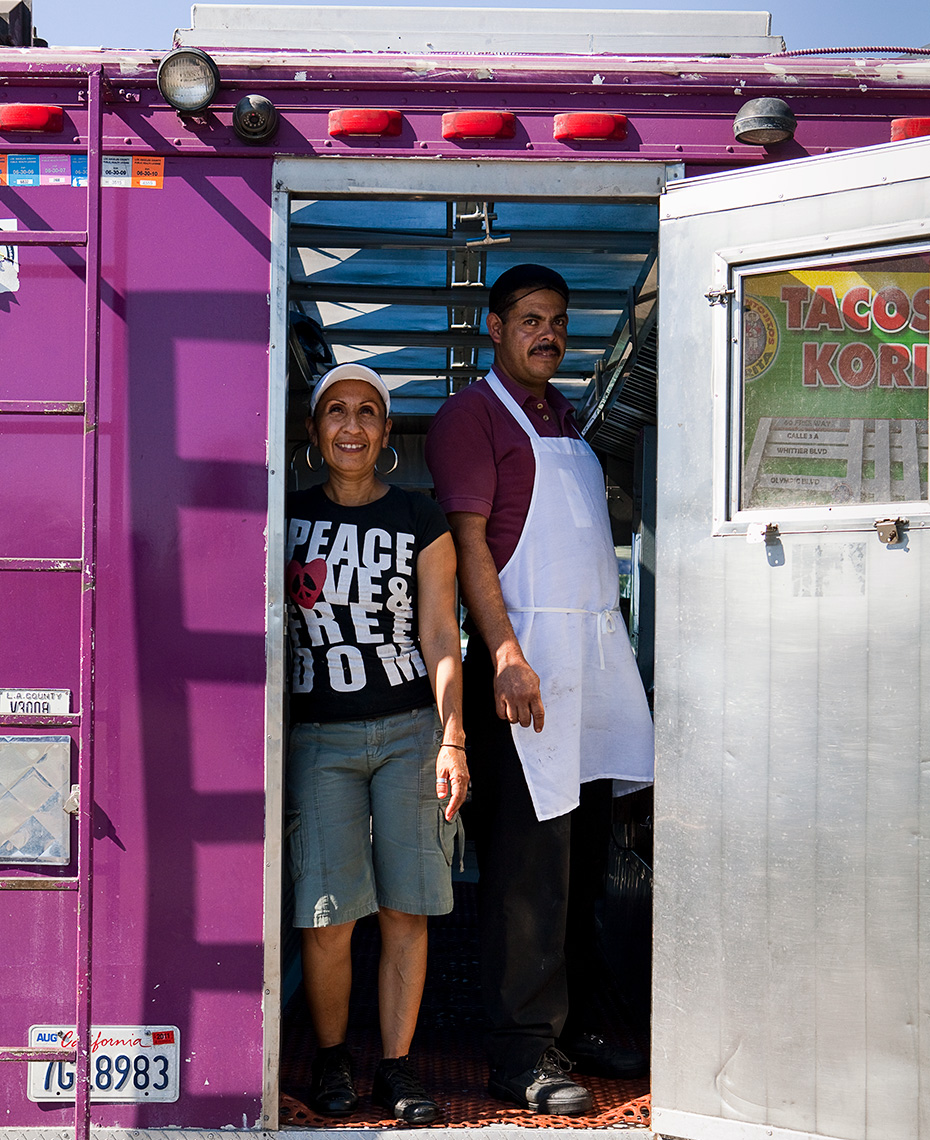 Two people in their food truck