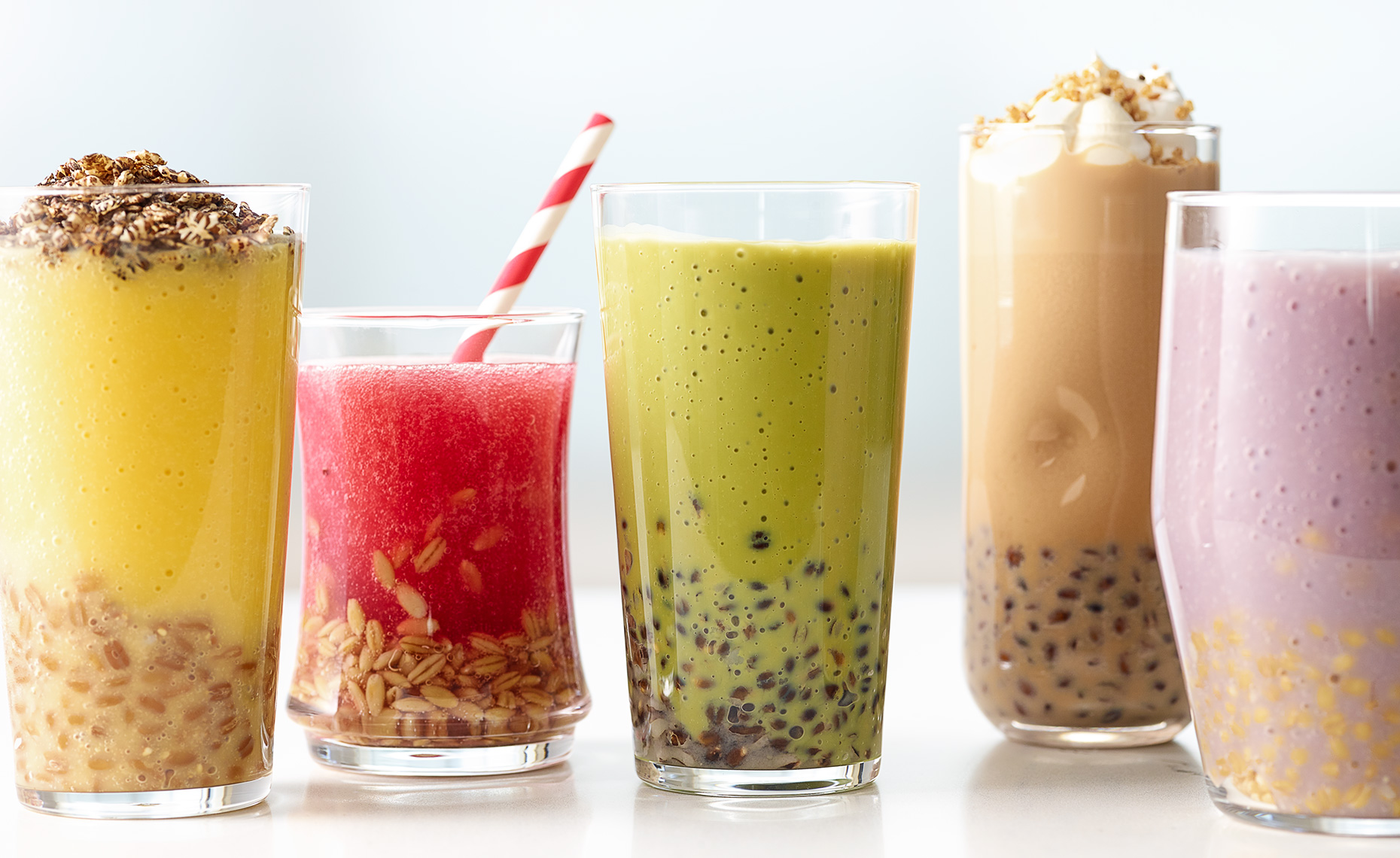 Mixture of smoothies with fruits and healthy grains
